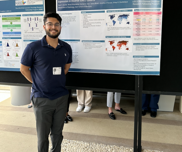 Student in front of USC/CHLA Summer Oncology Research Fellowship Program Program